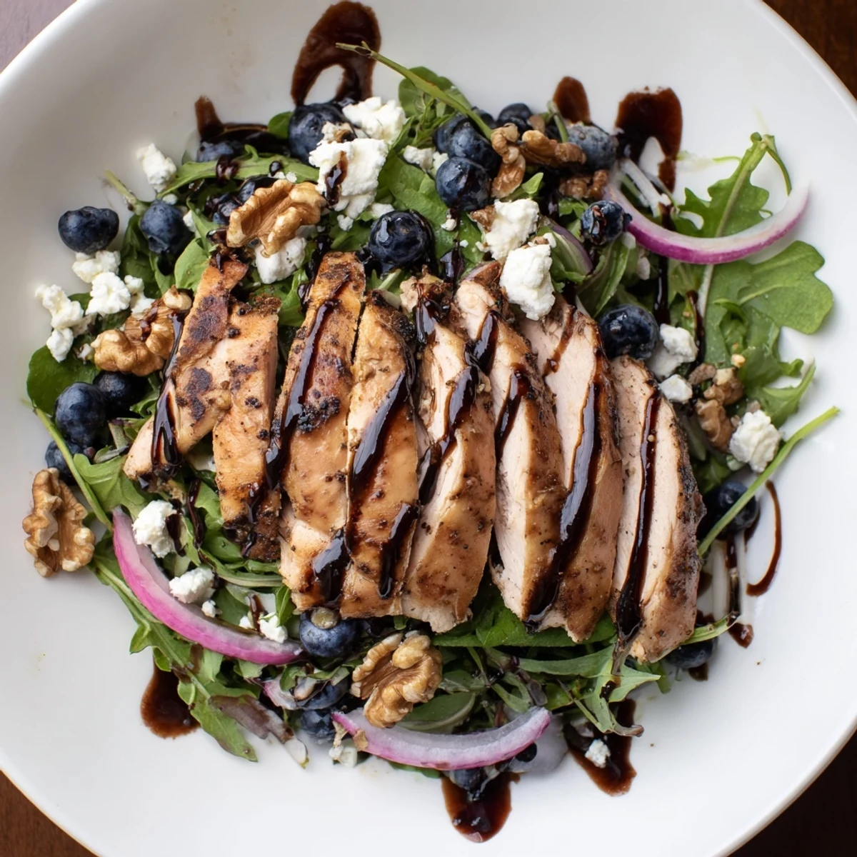 Juicy blueberries and goat cheese mingle with grilled chicken in this vibrant Blueberry Goat Cheese Chicken Salad.
