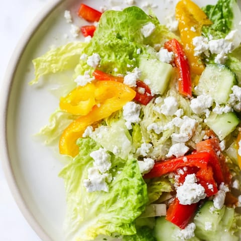 Crisp vegetables are tossed in a zesty dressing in this refreshing Bella Hadid Salad recipe.