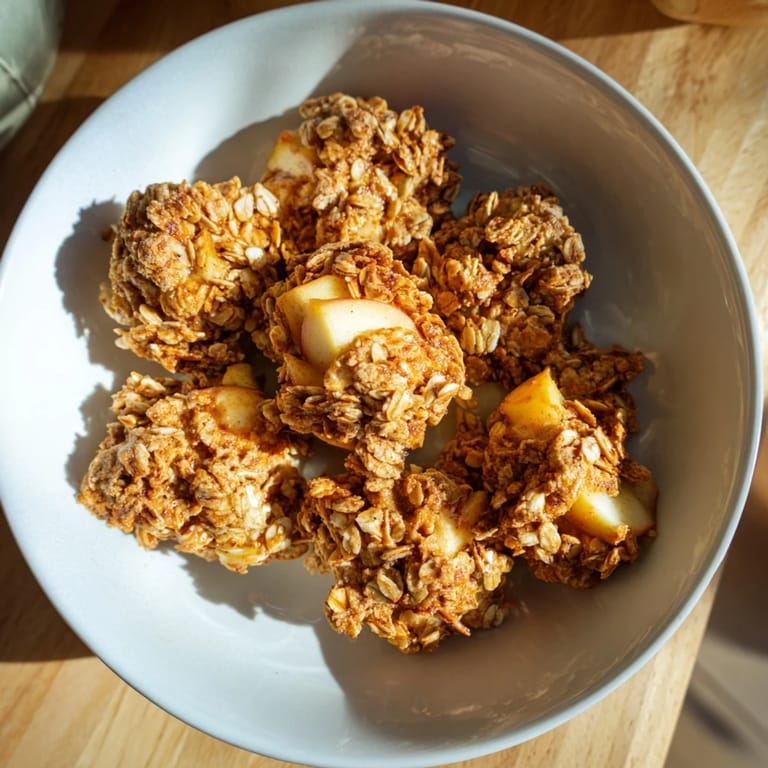 A freshly baked Soft Crumb Apple Crisp, featuring a buttery crumble topping and tender, spiced apples.