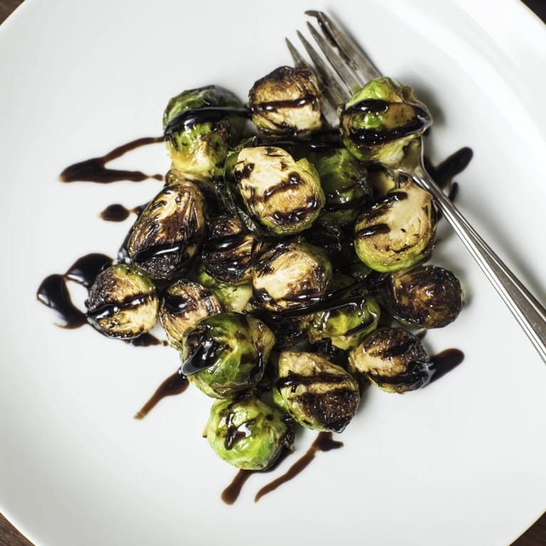 Fresh roasted Brussels sprouts with balsamic caramelization, served warm as an easy vegetarian and gluten-free side dish.